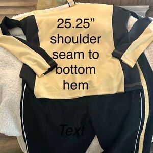 Almost new set of exercise/warmup top and slacks